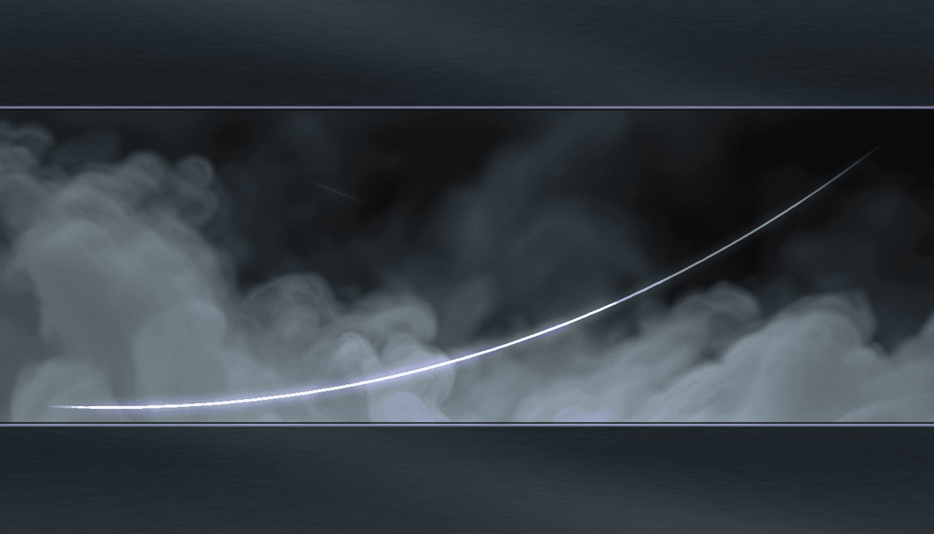 A condensation track curving through the magnetic field and terminating in a sharp bright point